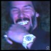 Keanu Reeves Grunge Style Smiling With Grillz Watch PNG